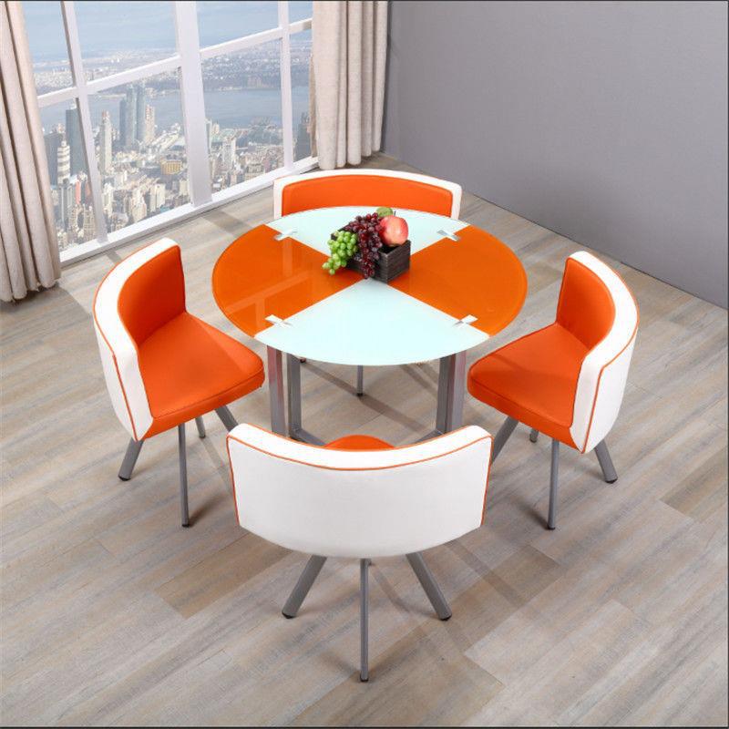 Mesa y sillas de comedor modernas, mesa redonda pequeña de vidrio templado, mesa y sillas para recepción y negociación, una mesa y cuatro sillas, cocina de inducción.