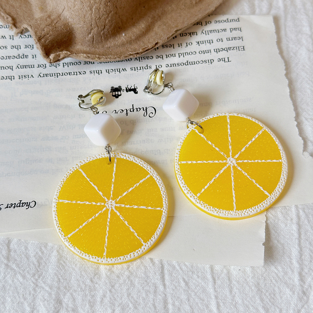 Versión coreana del temperamento de camelia, sin orejas perforadas, pinza para la oreja, flor de perla, tablero de ajedrez, pinza para la oreja triangular con diamantes, pendientes de nicho para mujeres