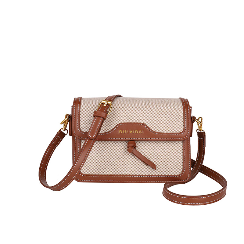 Bolsos de lujo ligero de alta calidad para mujeres 2026 comercio exterior nuevo lienzo retro empalme multi-bolsillo multicapa bolso de mochila
