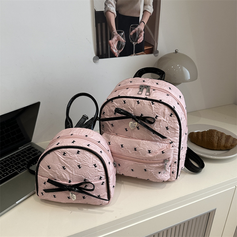 Mochila para mujer 2025 verano nuevo estilo súper fuego moda bowknot mochila portátil mochila escolar para estudiantes de gran capacidad