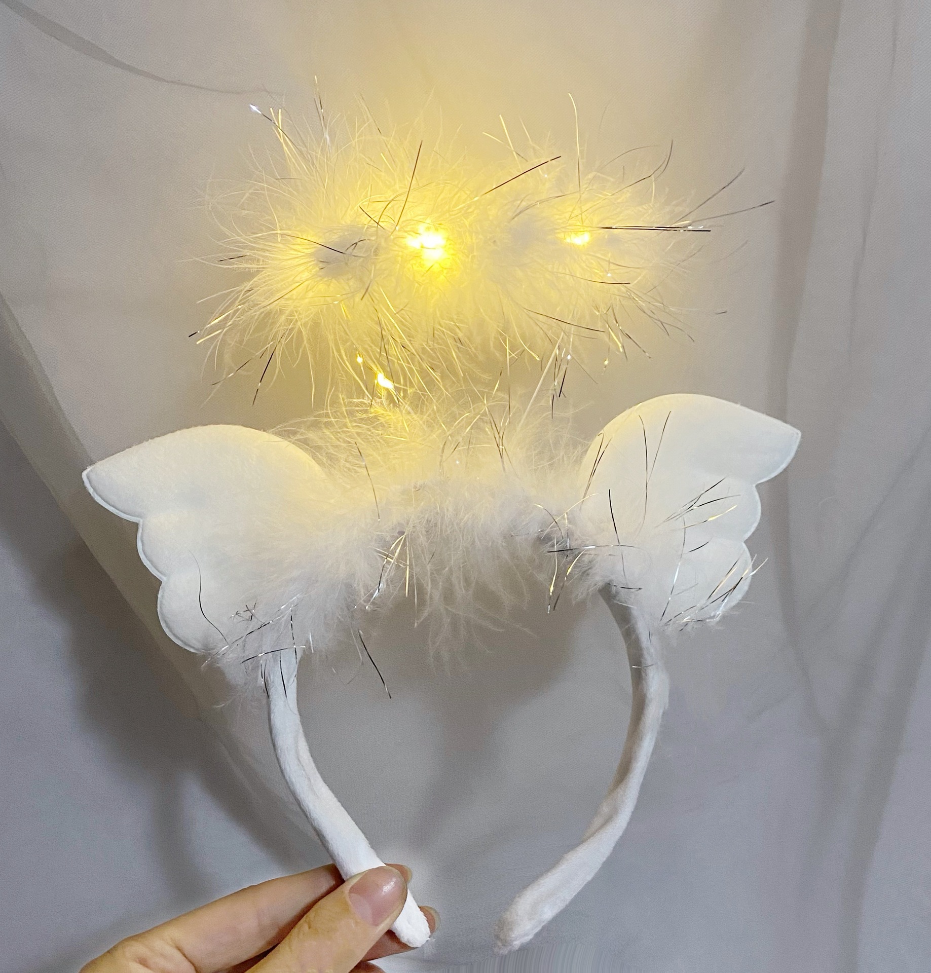 Nueva diadema con orejas de conejo de plumas con luces intermitentes, accesorio para la cabeza súper brillante, horquilla luminosa, popular en atracciones turísticas y puestos callejeros, venta al por mayor.