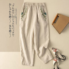 綿麻のレトロな刺繍のダイコンのズボンの子供の夏の新型のまっすぐな筒のハーレムのズボンのゆったりしている純色の百合のカジュアルな9分のズボン