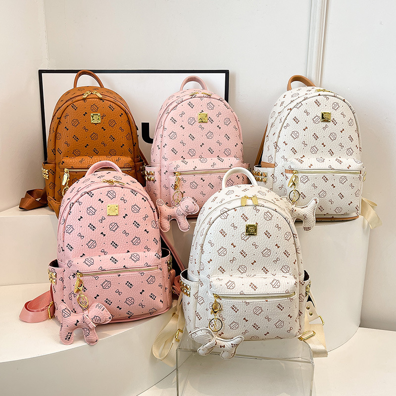 2025 nuevas mochilas escolares para estudiantes universitarias, lindos gatitos, mochilas para damas, bolsos de comercio exterior de gran capacidad para el trabajo y los desplazamientos