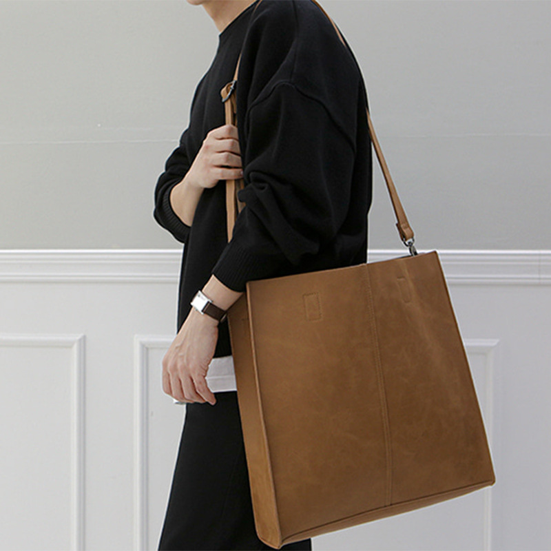 Korean version of fashionable PU leather shoulder bag, simple commuter men's and women's tote bag, square vertical crossbody large-capacity handbag_voghion.com