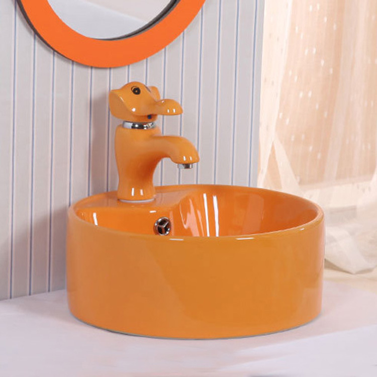 Lavabo de color para niños de jardín de infantes lavabo de cerámica tamaño pequeño lavabo para niños mesa redonda lavabo fabricante