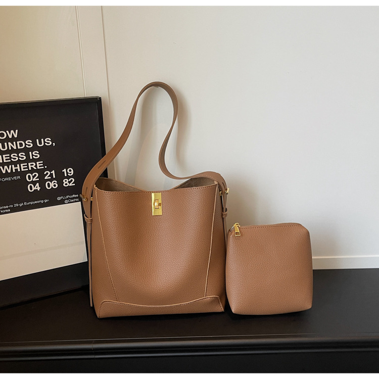Bolso de mujer nicho sensación de alto nivel litchi estampado bolso de balde 2026 nuevo estilo de alta capacidad de moda bolso de hombro