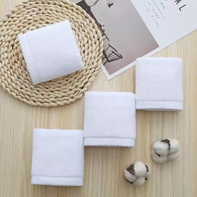 Goyang Hotel toallas blancas de algodón espesar la absorción de agua no se cae el pelo de algodón hotel de cinco estrellas para desarrollar logotipo