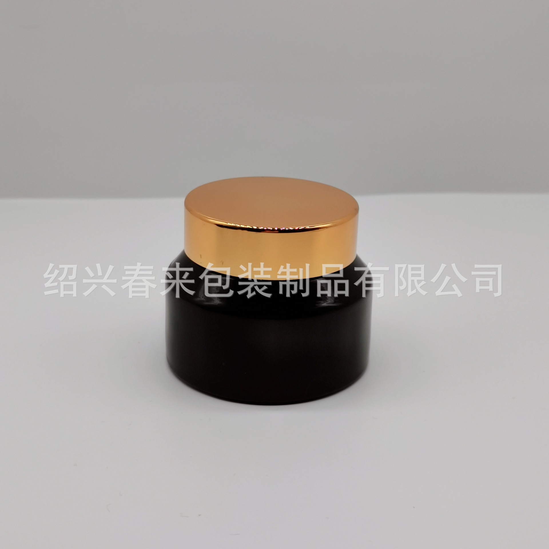 厂家直产50g原色黑色玻璃斜肩罐膏霜瓶配亮金盖子