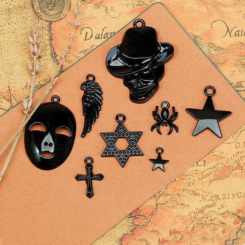 Alloy mask skull electrophoresis black accessories material wholesale DIY pendant jewelry cross wings black pendant