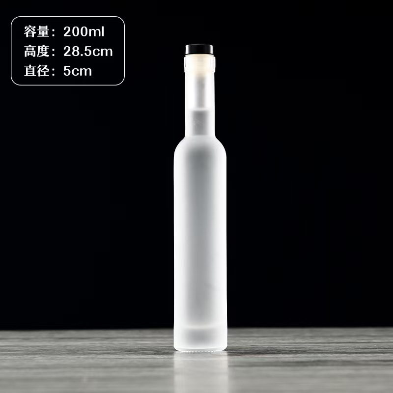 Botella de vidrio de vodka de alta calidad botella de vino de fruta cristal transparente de arena blanca dividida botella vacía con película de retracción térmica en stock