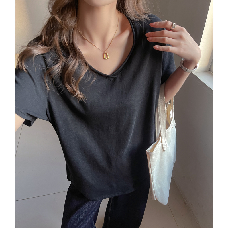 Selección estricta coreana suelta camiseta de mangas cortas mujeres primavera y verano con cobertura de carne para adelgazar se puede usar hombro en V cuello camiseta de base superior