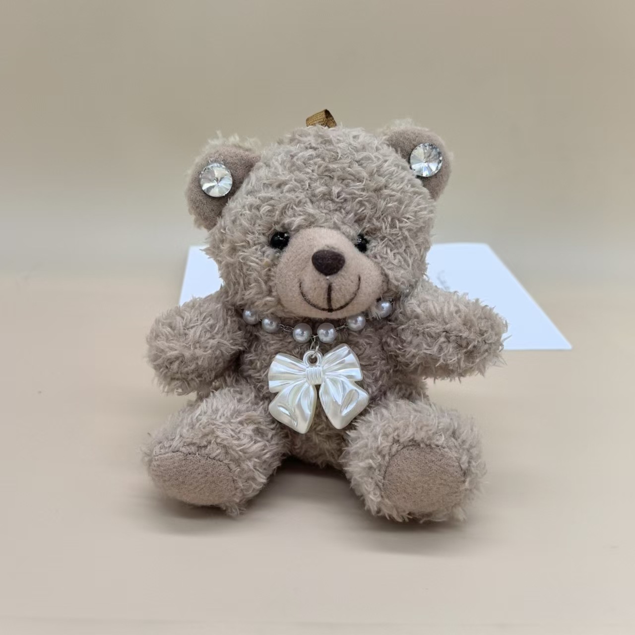 Versión coreana de Dongdaemun con la misma letra de amor dibujos animados oso de peluche muñeco de peluche bolso de muñeca colgante al por mayor