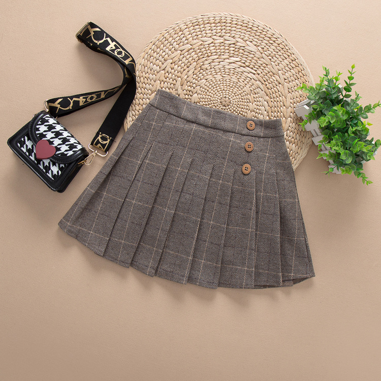 Falda de niñas 2023 Otoño e Invierno Nueva falda a cuadros anti-exposición JK Falda plisada falda de lana falda engrosada