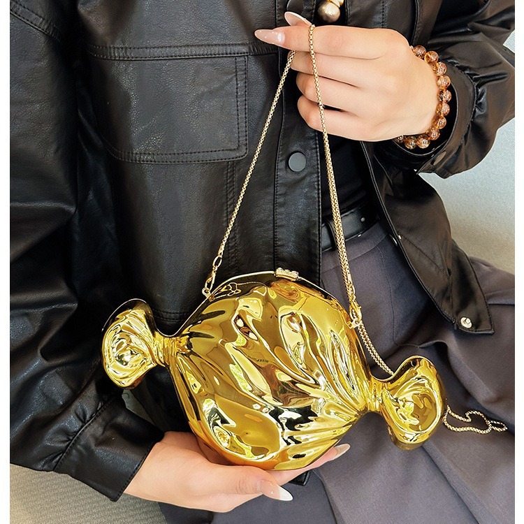 Bolsa de cena de lujo ligera transfronteriza cara brillante personalidad forma de caramelo bolso de mochila moda acrílico cadena bolso de noche mujer