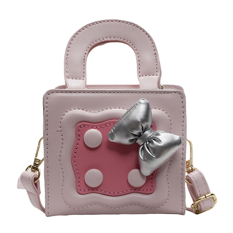 Bolso lindo japonés 2025 primavera nuevo bolso femenino lazo en contraste bolso de hombro mini bolso de mensajero para niños