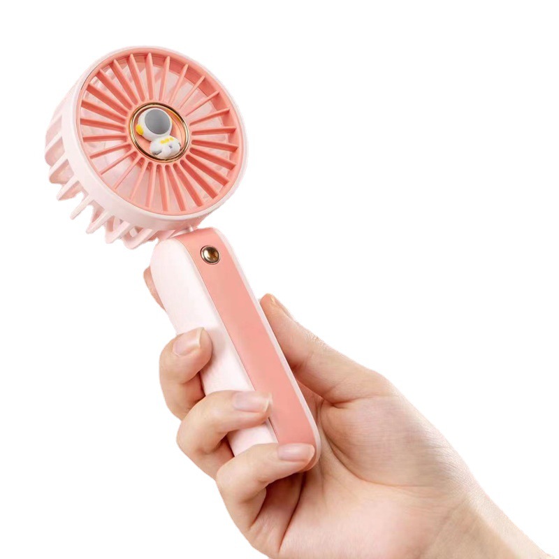 2022 nueva carga portátil pequeño ventilador astronauta mini ventilador portátil estudiante de dibujos animados mudo ventilador eléctrico