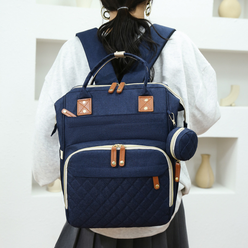 Momia bolsa de gran capacidad portátil madre-niño bolsa multifuncional seco y húmedo separación antirrobo mochila portátil al por mayor