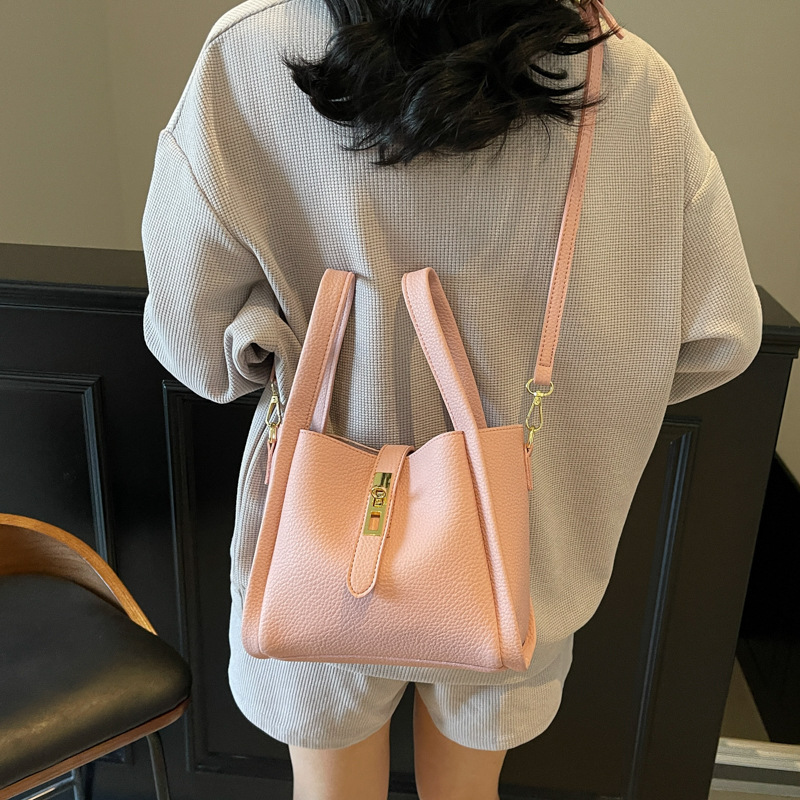 Cestas de verduras bolsas de mano mujeres 2025 nuevo retro moda bolsas de cubo de alta sensación nicho hombro bolsas de mujer