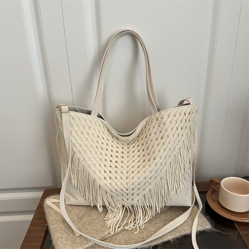 2025 nuevo bolso de bordilla retro bolso de mujer agujero bolso de tejido a mano bolso de playa bolso de hombro de la señora Sen Meng