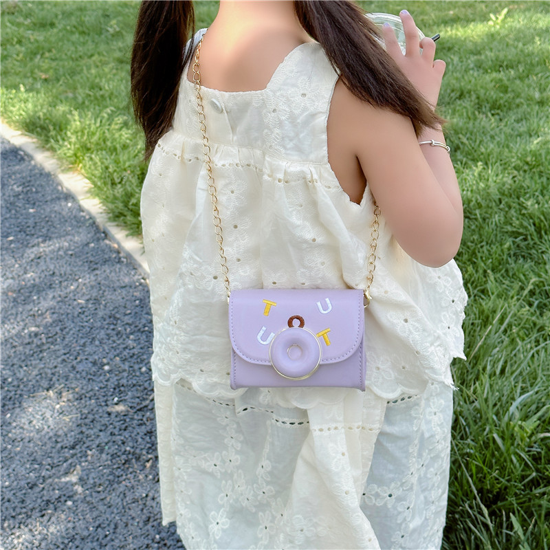 2025 otoño nuevo bolso de moda para niños color caramelo PU bolso de hombro para niñas bolso de cadena de hombro bolso de accesorios para bebés