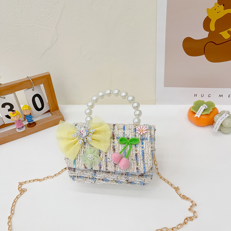 Nuevo bolso de mensajero de La Niña de los niños niña estilo de Chanel estilo occidental Linda niña linda de dibujos animados portátil pequeña bolsa