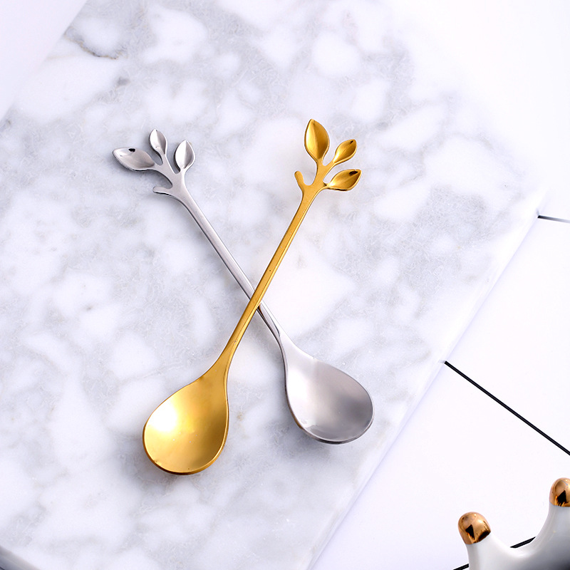 Sæt med ske og gaffel i bladform til dessert i rustfrit stål_voghion.com