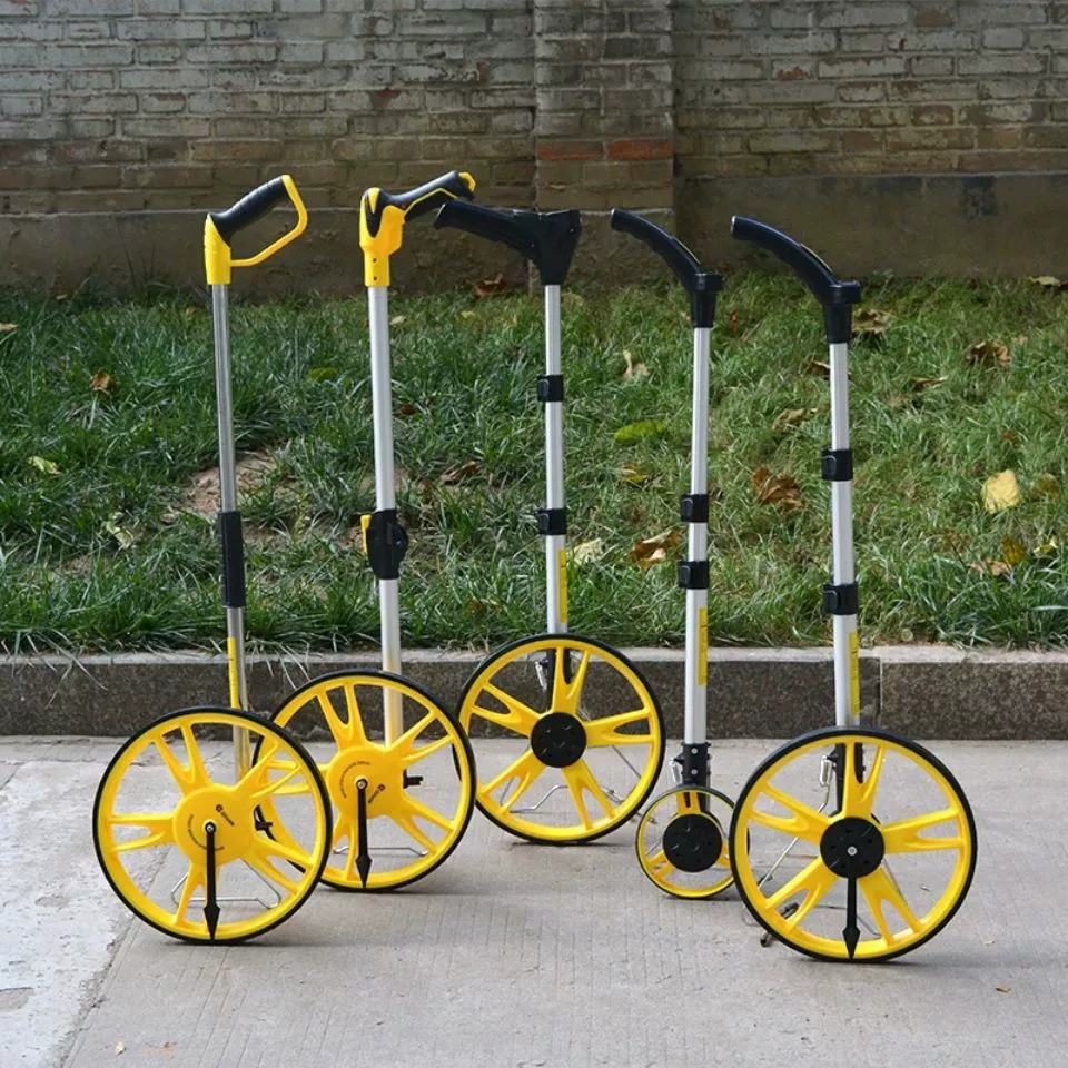 Колесо дальнего колеса вручную толкает колесный дальномер