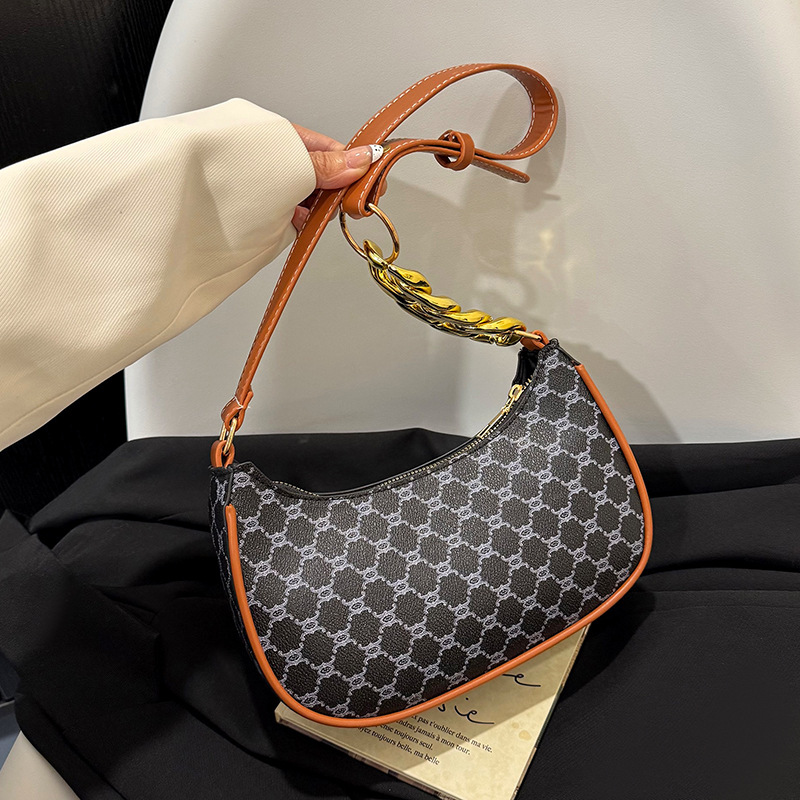 Bolso retrógrado para mujeres 2026 nuevo estilo de moda francés nicho diseño de alta sensación de hombro bolso de brazo bolso de mano