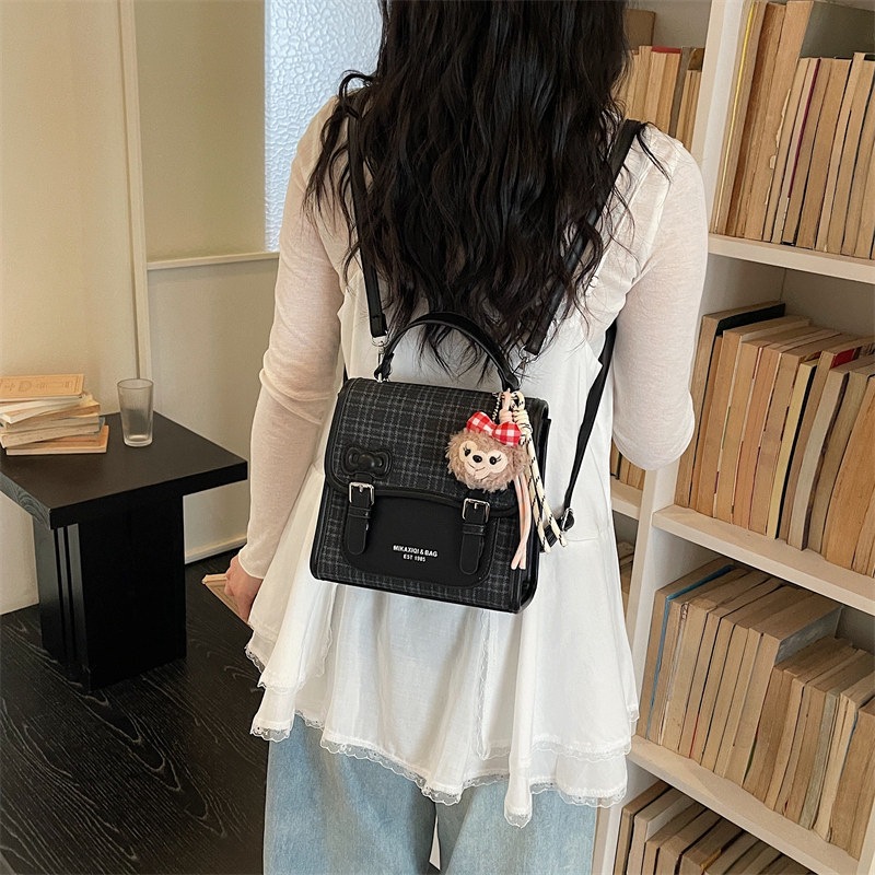 Mochila universitaria popular para estudiantes mochila casual de mujer estilo a cuadrícula nicho 2026 escuela de moda de verano nuevo estilo