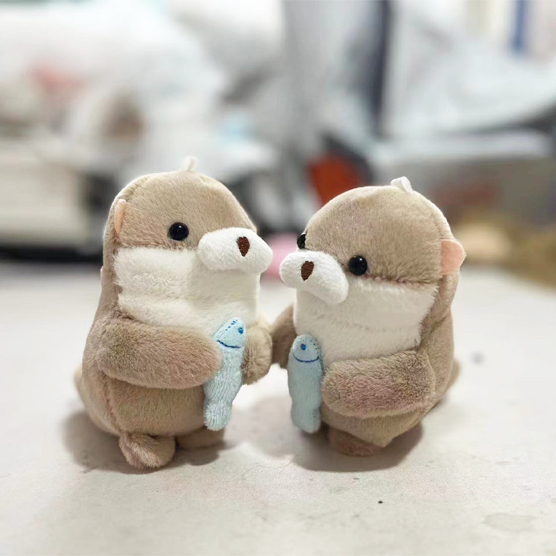 Red celebridad super lindo deseo pescado nutria pequeño castor colgante llavero creativo muñeca de peluche bolsas colgante al por mayor