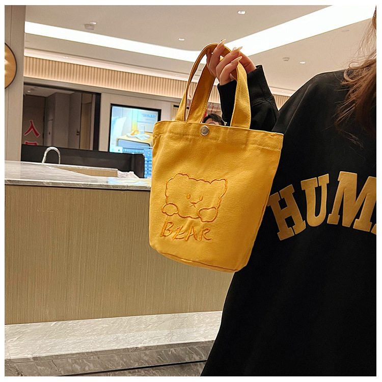 Personalized ladies' bucket bag, versatile and cute canvas bear wholesale, simple Japanese style new handbag undefined