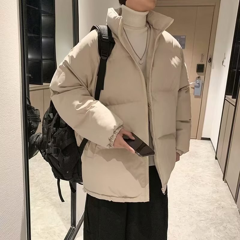 Abrigo de algodón acolchado para hombre de invierno engrosado 2022 nuevo color puro estilo de Hong Kong casual de moda Suelta todo fósforo abrigo de pan caliente