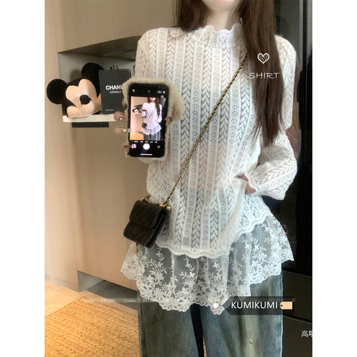 White long-sleeved, high-neck, lace-trimmed, loose-fitting, slightly sheer base layer top for spring.