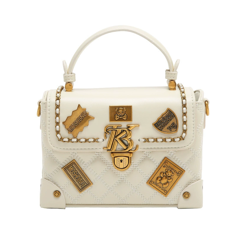 Handheld bag with diamond pattern, small badge, box, 2023, Chanel style