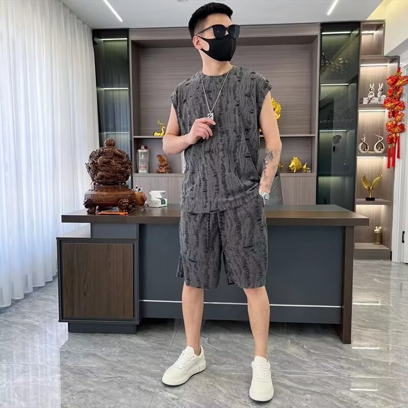 Verano nuevo estilo de hombre estilo de Hong Kong hueco agujero conjunto casual marca de moda chaleco de hombro corto conjunto de dos piezas