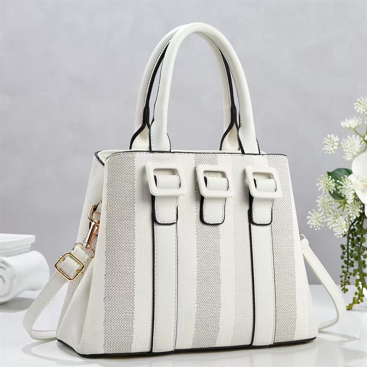 Bolsa de mano casuales a rayas simples temperamento de moda bolsas de hombro de viaje diario versátil mochila bolsas transfronterizas