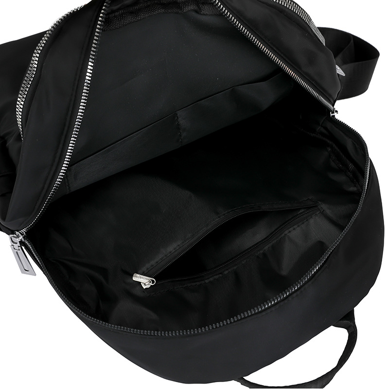 2025 nueva mochila de nailon casual para mujer, mochila de viaje al aire libre de gran capacidad en relieve de moda, mochila escolar para estudiantes