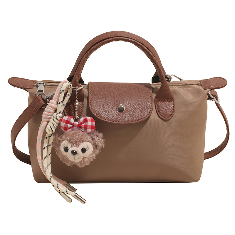 Bolsa de mano francesa de nicho Zhonglong para mujeres 2025 nuevo paquete de hombro casual universal para viajar bolso de alta calidad