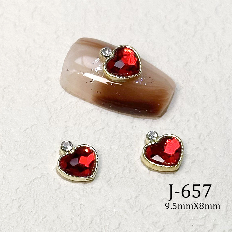 2023 Nueva joyería de uñas Año nuevo rojo aleación conejo rojo mariposa de cristal pintura en aerosol arco accesorios de diamantes de uñas