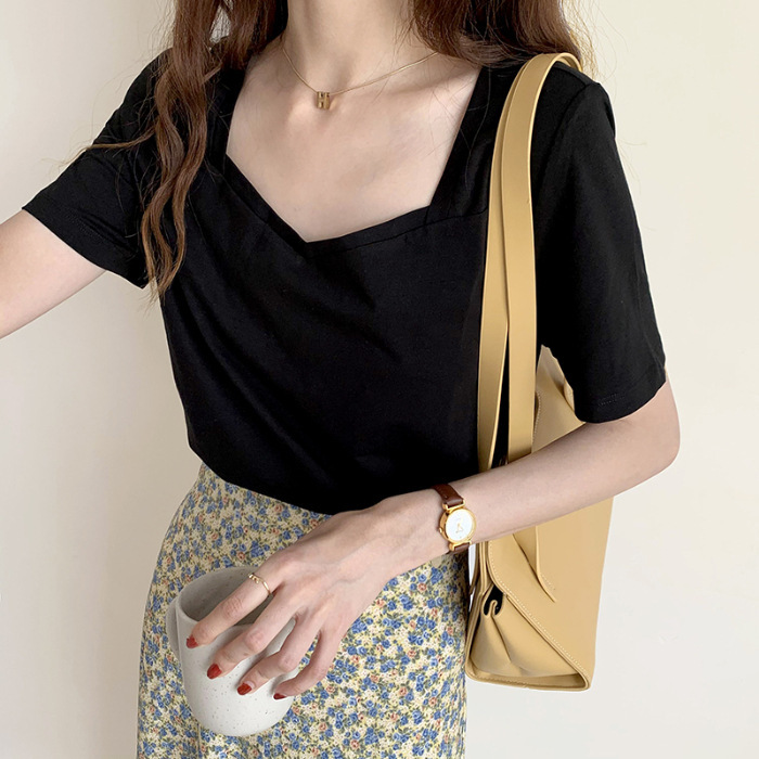 女性のための白い半袖 T シャツ 2025 夏の新スタイルスクエアネックルーズレトロ右肩 V ネックデザインニッチトップトレンディ|undefined