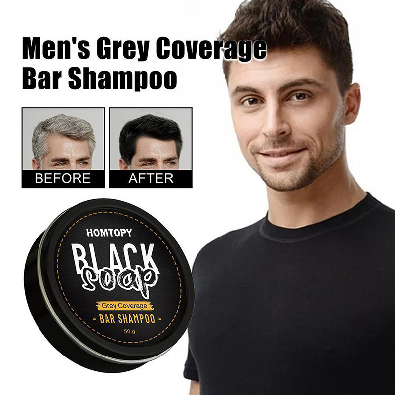 Homtopy black soap men’s grey coverage bar shampoo for dark hair 50g in a sleek black circular container with white and gold text designed to mask grey hair.