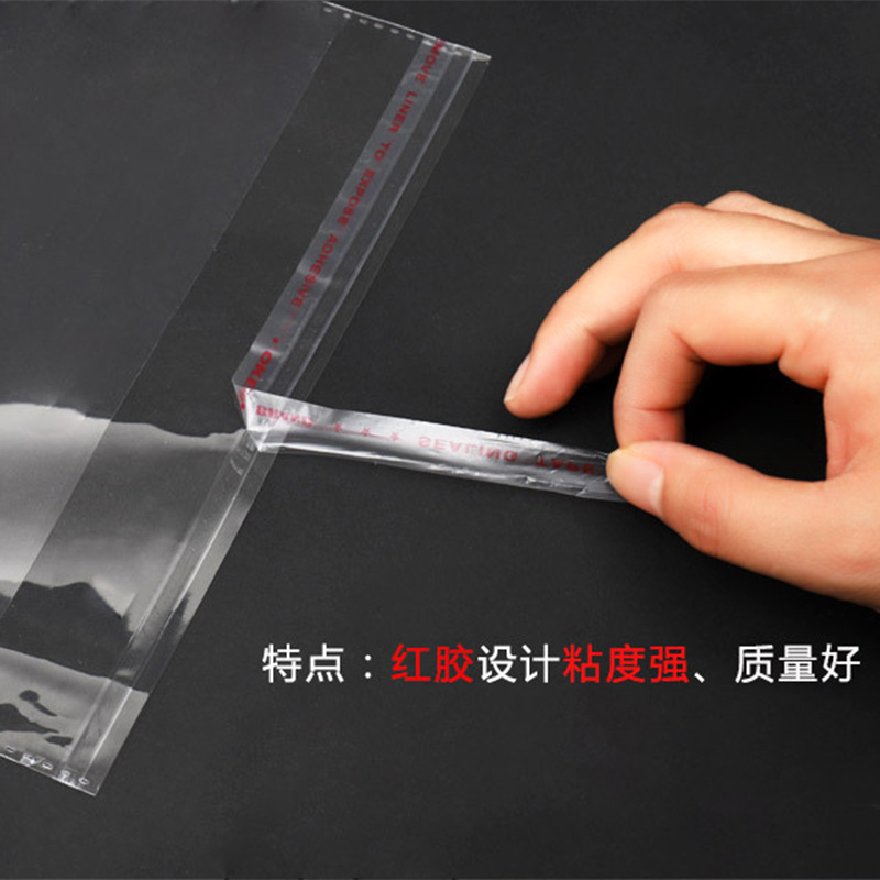 Fábrica en stock OPP bolsa autoadhesiva bolsa de embalaje de ropa transparente de fábrica al por mayor bolsa de ropa LOGO 100