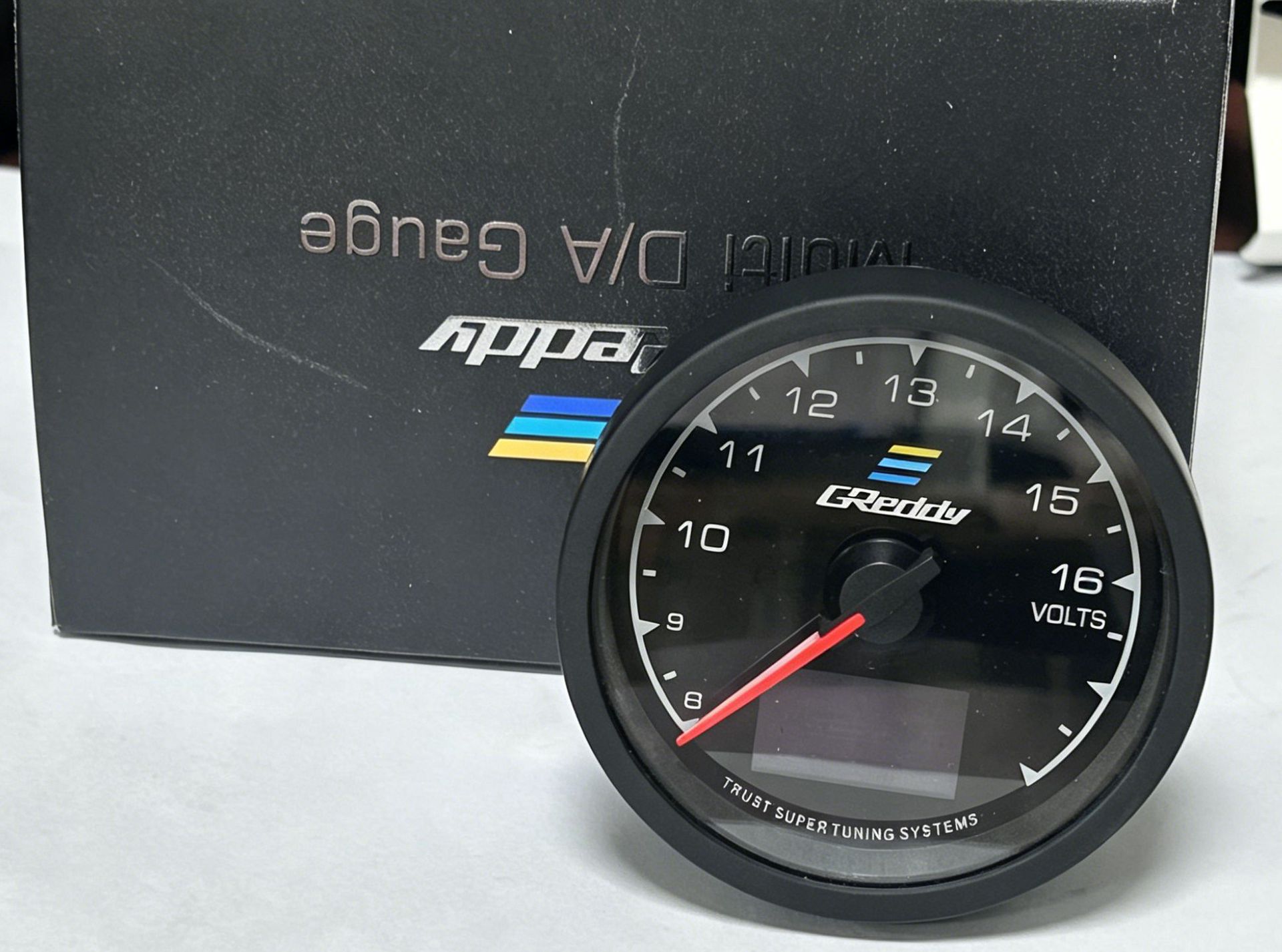 Greddi Pointer-Type Lcd Instrument Voltmeter for Real-Time Monitoring of Vehicle Electrical Systems, Automotive Modification Instrument Wholesale