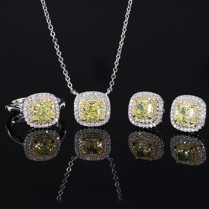 Otoño e invierno nuevo estilo Zhuangsheng conjunto de joyas con alto contenido de carbono diamante flor de hielo cobre cortado con incrustaciones de manzana conjunto verde piedra principal 6*6