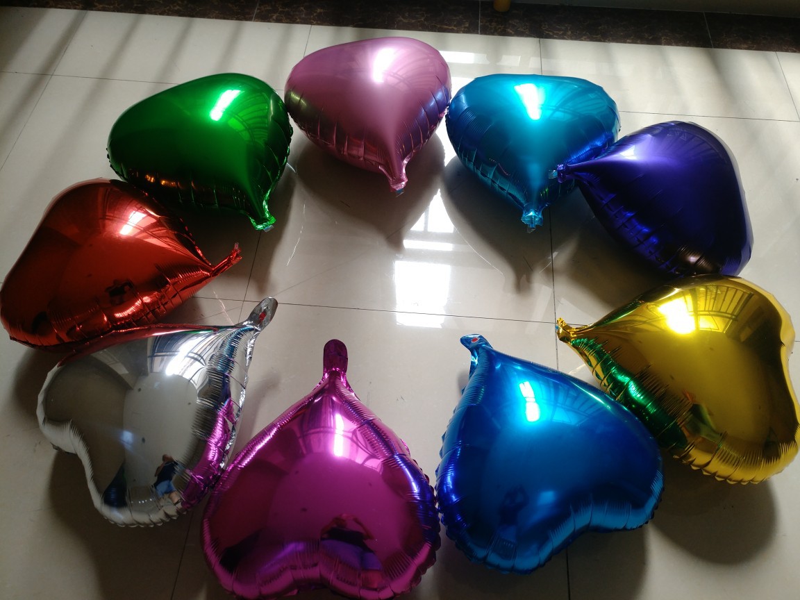 Inflatable balloon heart shaped