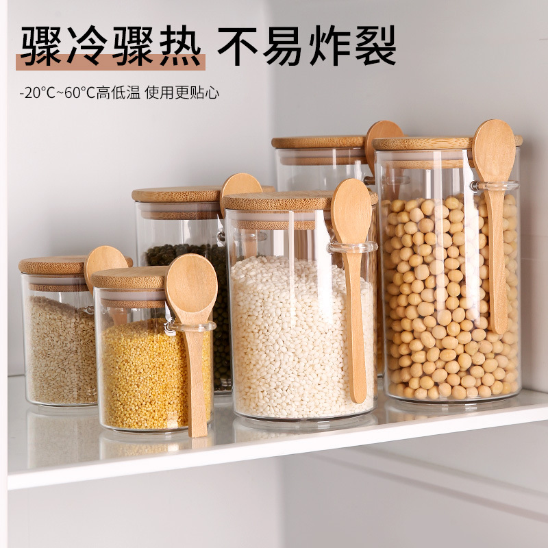 Venta al por mayor de fábrica de tapas de bambú de estilo japonés, tarros de almacenamiento de granos diversos con cuchara, tarros de almacenamiento de plástico redondos para cocinas domésticas