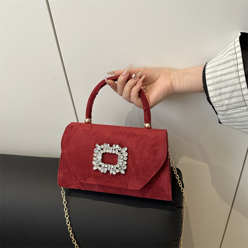 Versión coreana de simple y elegante color sólido 2025 verano nuevo casual cadena de cercanías bandolera bolso cuadrado pequeño de diamante brillante