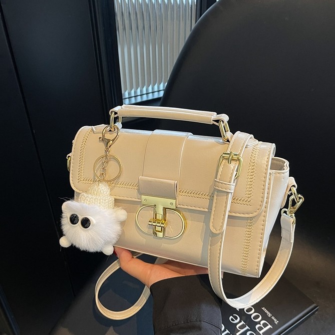 Bolsos de textura superior para mujeres 2025, nueva moda versátil bolso de mochila primavera y verano popular bolso de mano