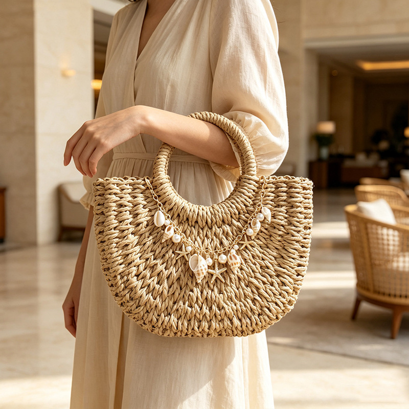 Women's Round Handbag in Straw Weave with a High-End Feel, Decorated with Sea Shells, Starfish, Conch, and Pearl Chains, Half-Moon Shape