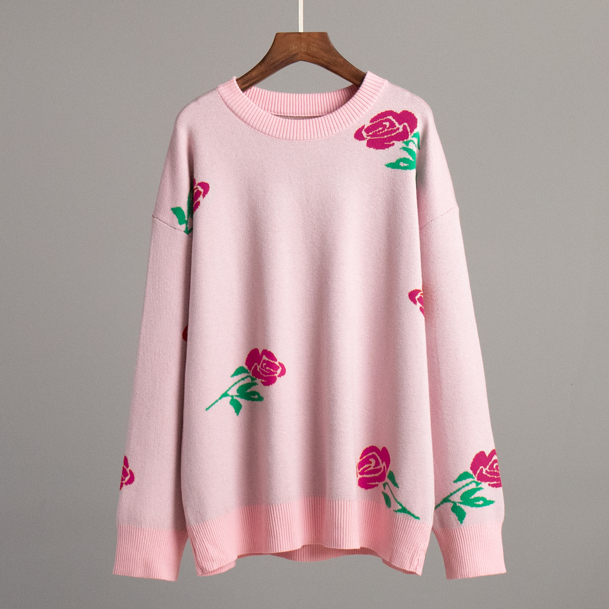 Suéter de cuello redondo transfronterizo Europa y los Estados Unidos 2025, otoño y invierno, nuevo estilo de mujer, suéter de cuello redondo de color rosa suelto
